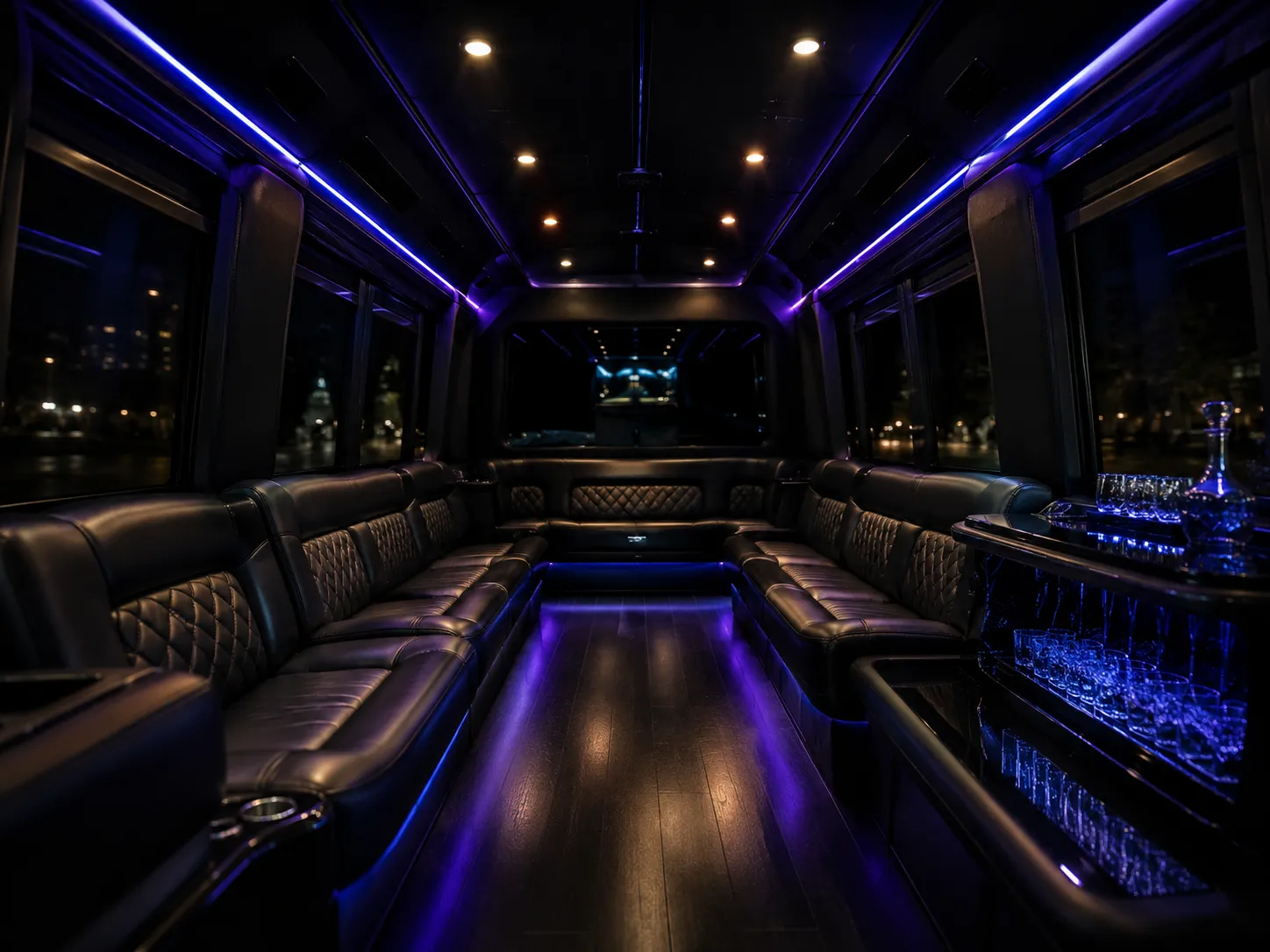 Detail of dark leather bench seating and ambient interior cabin lighting — temporary crop reused from the party bus interior photo
